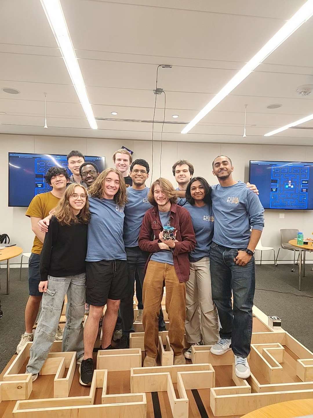 Picture of pacbot team and pacbot 4